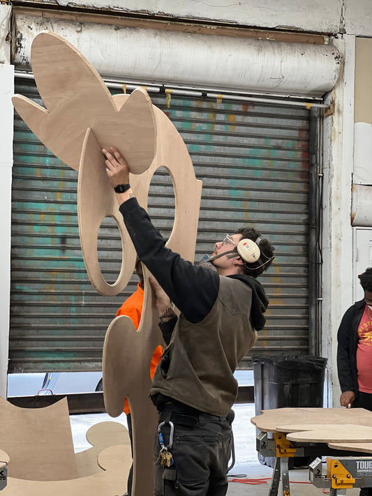 Height of Hurly Whirly in unfinished wood at Beam Center workshop